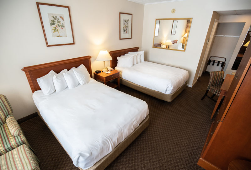 2 queen beds hotel room