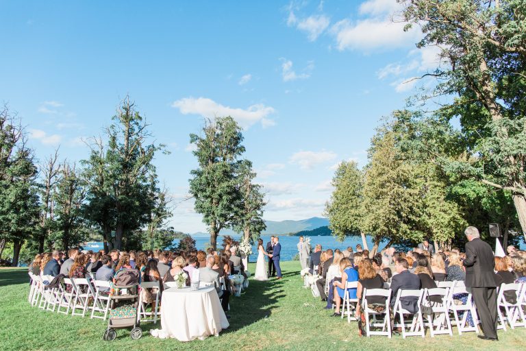 Wedding ceremony on the back lawn of the Fort William Henry hotel. Lake George in the Background.