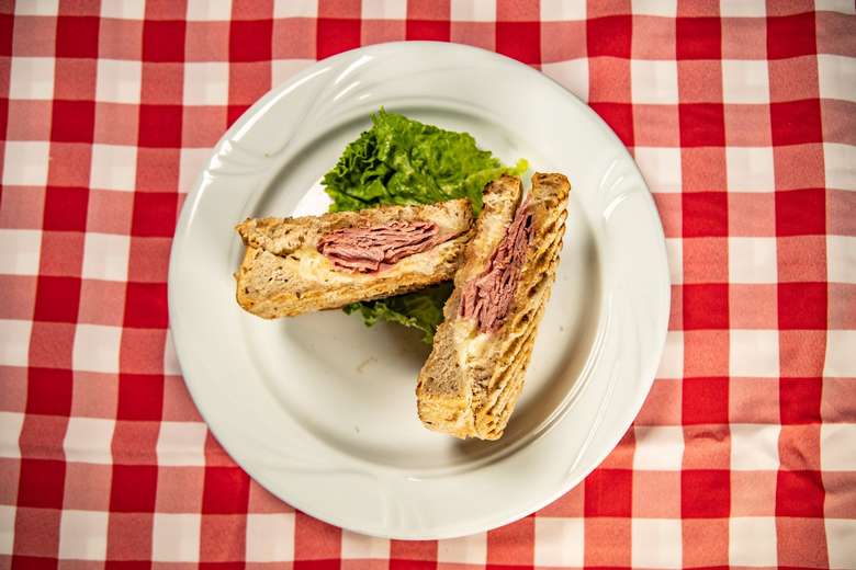 Sandwich on checkered table cloth