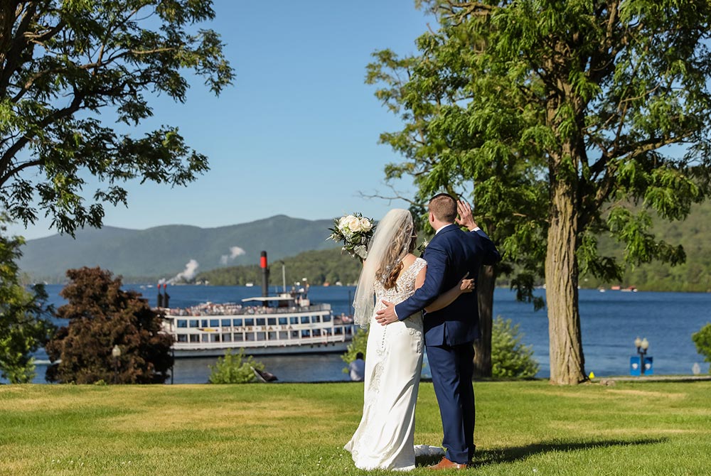 Bride and Groom watching steamboat go by