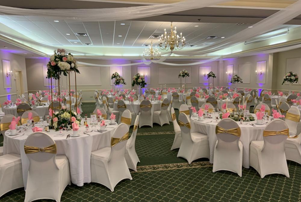 Wedding ballroom with tables and chairs