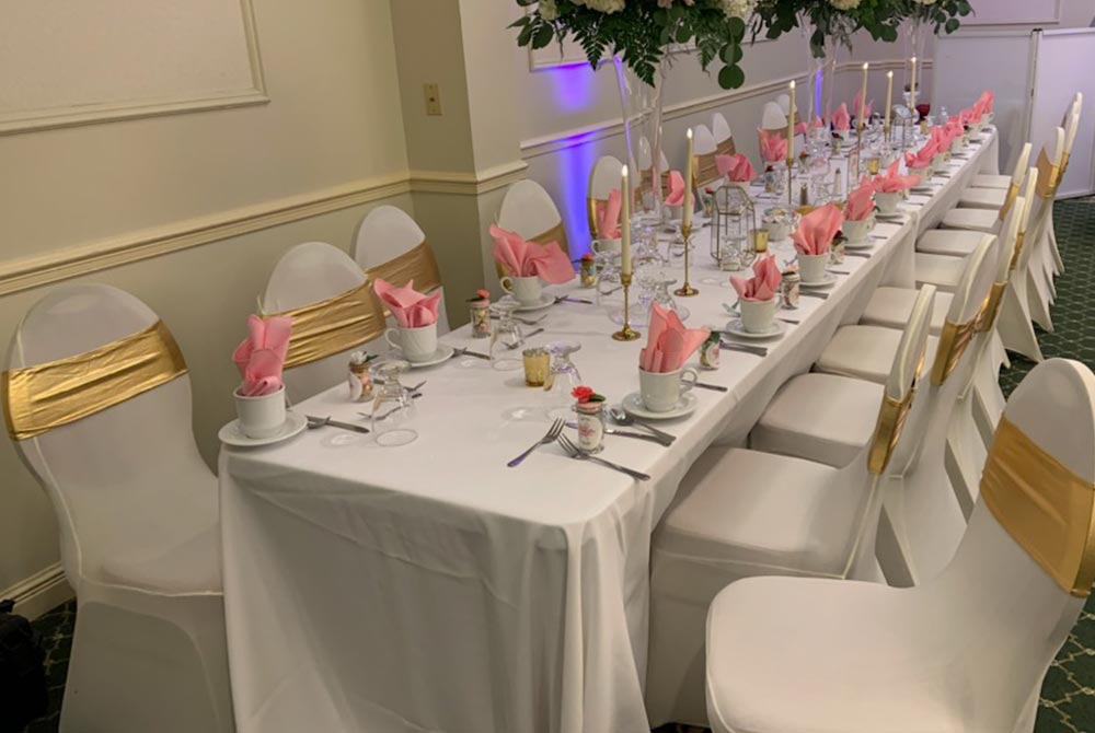 wedding table setup in ballroom