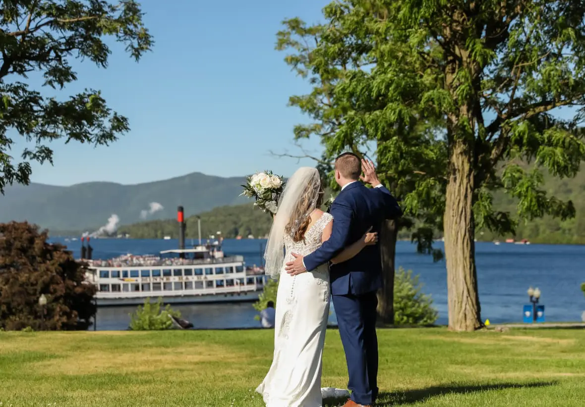 Bride and groom watching steamboat