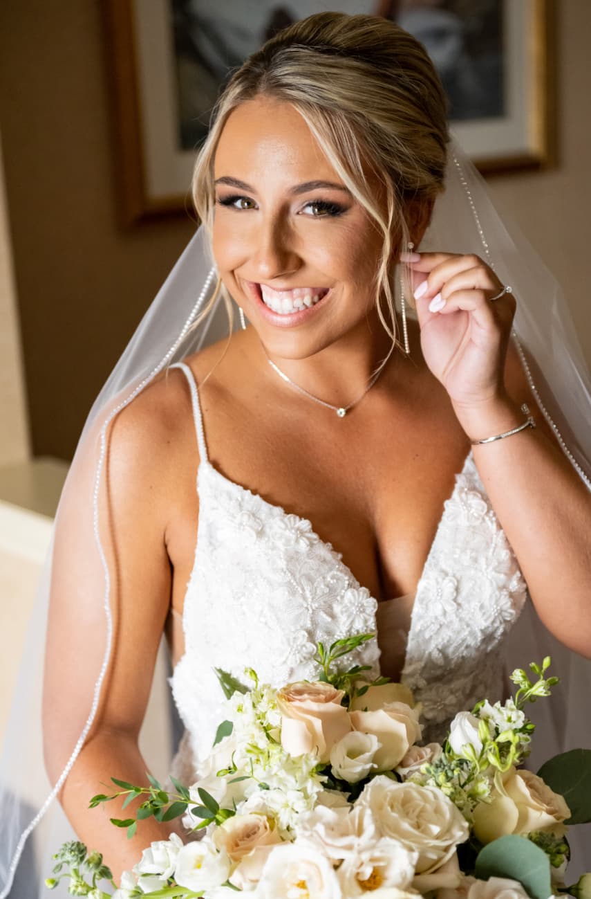 Bride in wedding dress with flowers